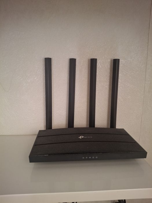 Роутер Wi-Fi Ptp-link.