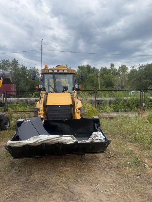 Экскаватор погрузчик новый 388