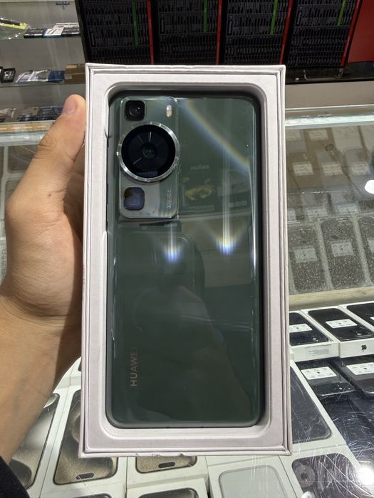 HUAWEI P60 Холати идеал экрани пасида синган жойи бор