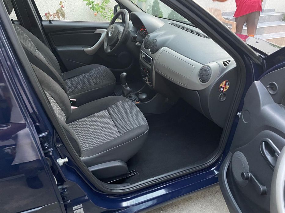 De vanzare exemplar dacia logan 1.4 mpi   Km 34.000 de mii reali