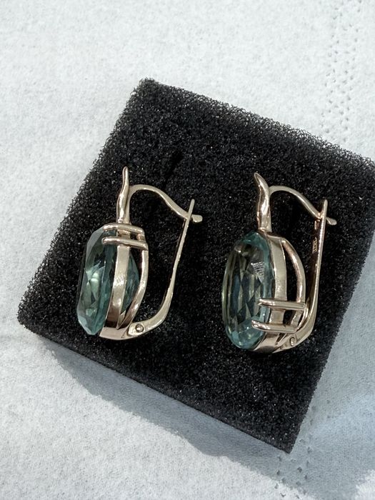 Продам золотые серьги