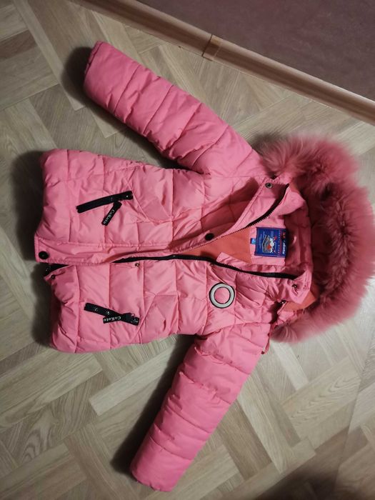 Продам пуховик на девочку б/у