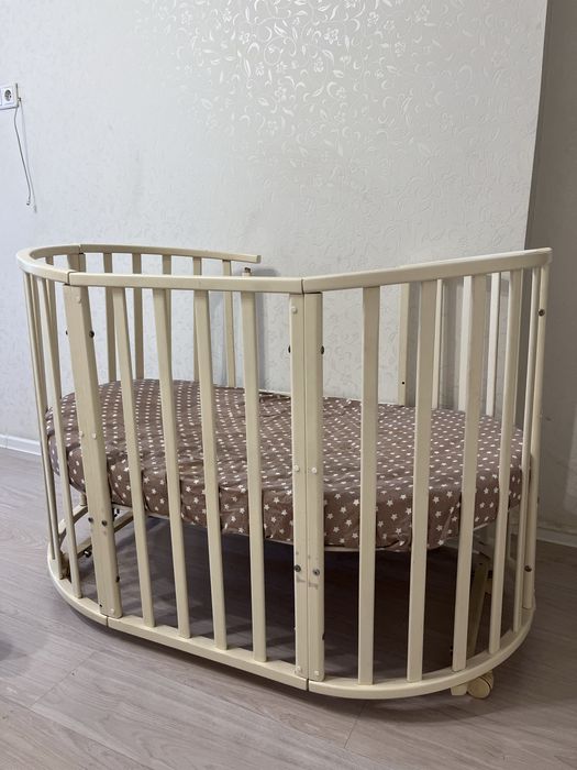 Детская кроватка трансформер с маятником