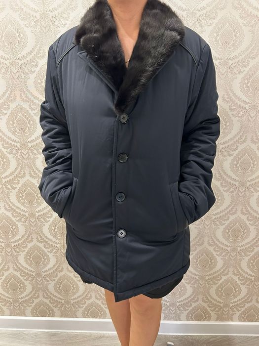 Продам зимний пуховик.