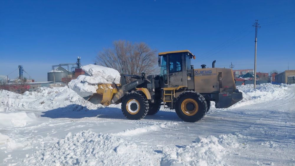 Услуги самосвалов и погрузчика