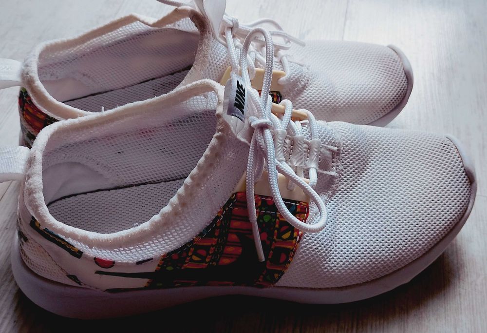 Маратононки Nike Juvenate Rare Merlin Print