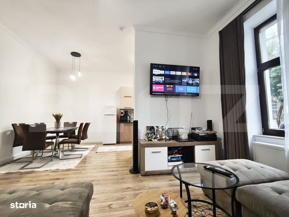 Casa la curte comuna pe 2 nivele, 3 dormitoare, Central