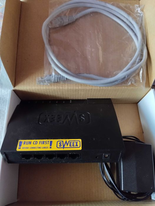 Router Sweex cu cablu