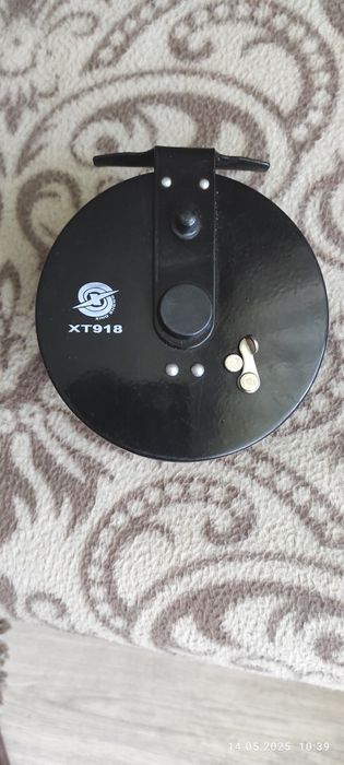 Катушка рыболовная.