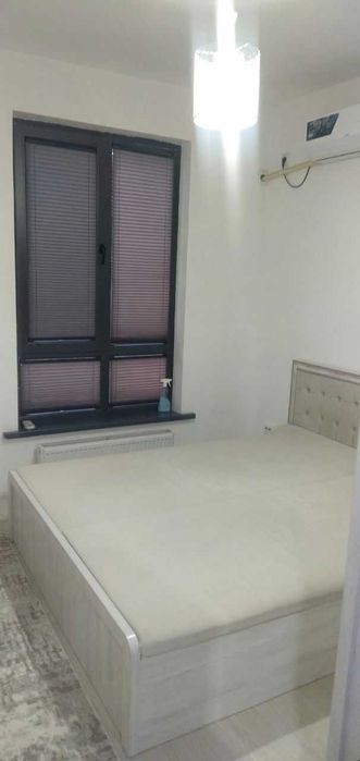 In the Yashnabad district, a two-room apartment is for rent.