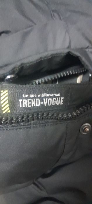 Пуховик удленённый,новый.