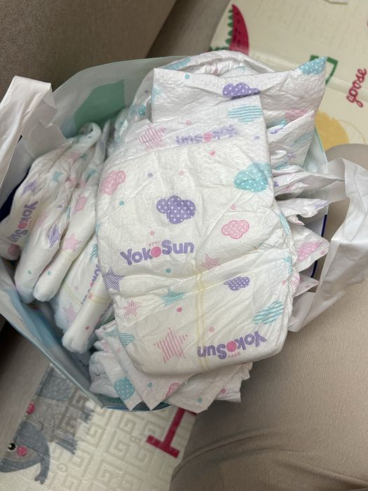 Подгузники Yokosun S 0-6 кг примерно полпачки