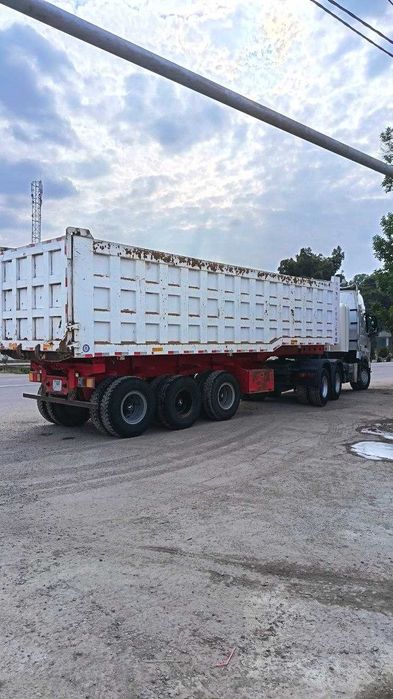 HOWO A7 тягач + самосвал полуприцеп сотилади
