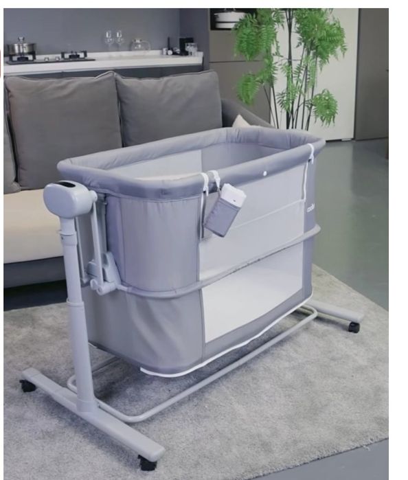 Продам электронный манеж-кровать