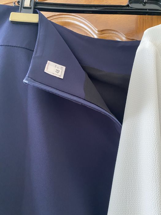 Set de 2 fuste conice si bluza eleganta cu dimensiuni afisate