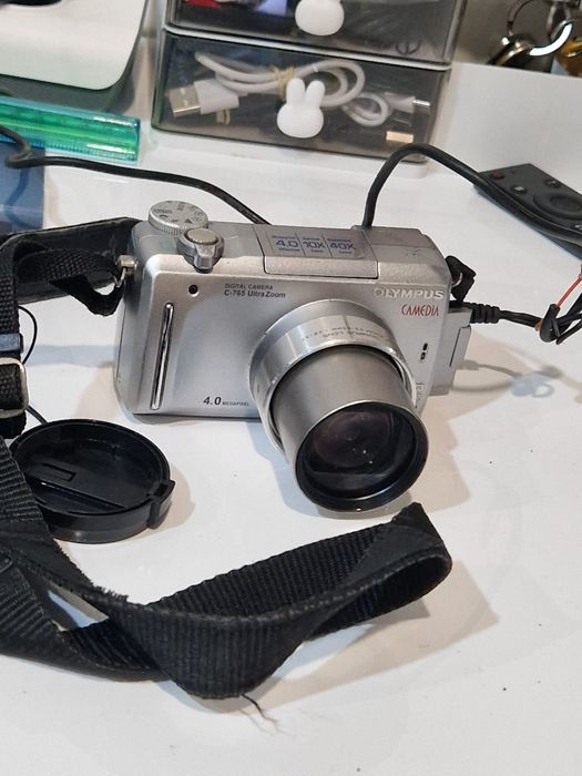 Aparat foto Olympus Corporation  NO: C-765, funcțional la priza