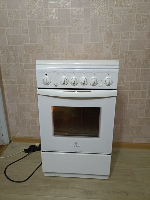 Продам газ плиту Deluxe