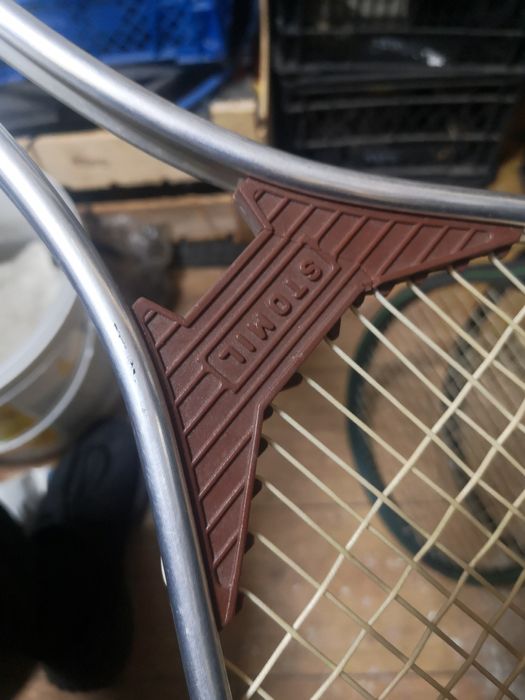 Теннисный ракетки