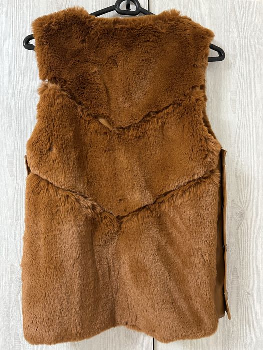 Дамски елек