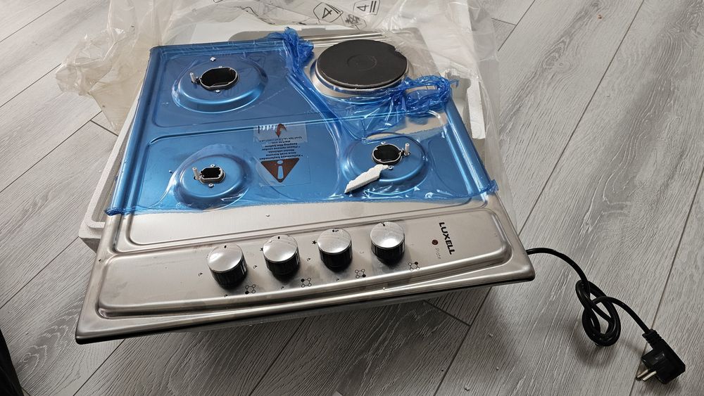 Новый газовый плитка