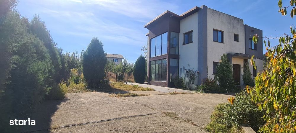 Proprietate cu 2 case 7 km Craiova in Ghercesti