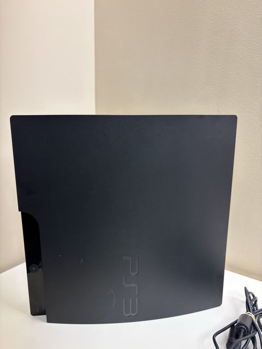 PS3 Slim modat 10 jocuri