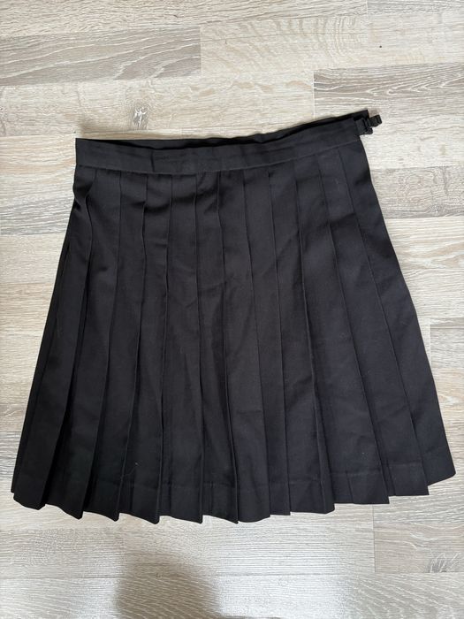 Плессерованая черная юбка