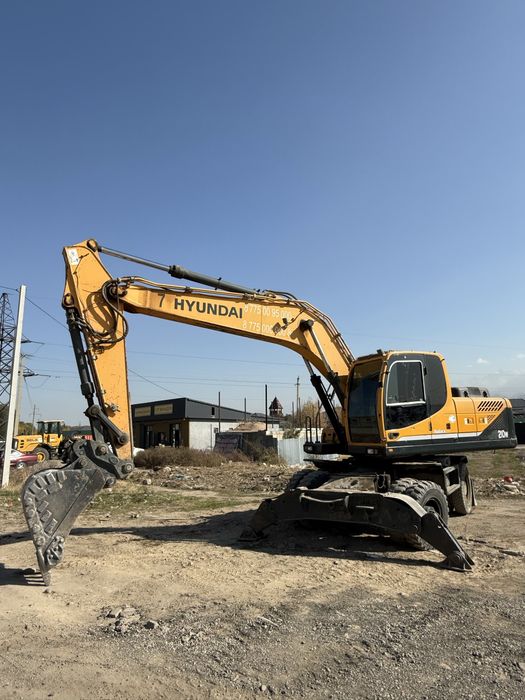 Услуги экскаватора бобката мини погрузчик