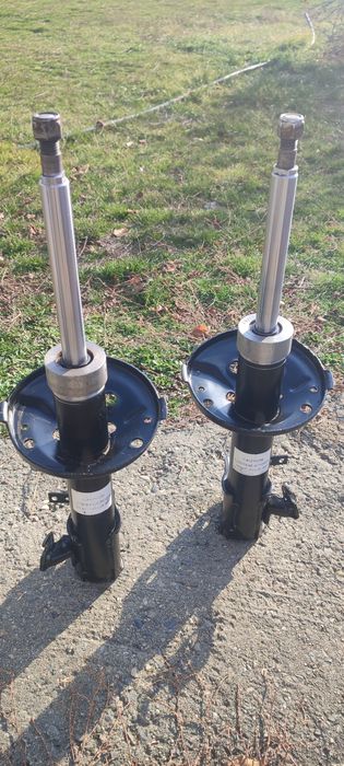 Передние амортизаторы карина е