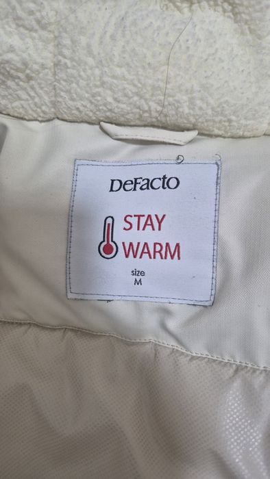 Продам зимний пуховик