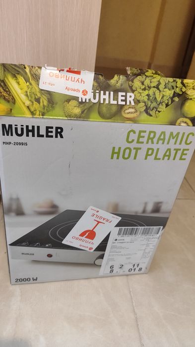Керамичен котлон Muhler MHP-2099IS, 2000 W - работещ.
