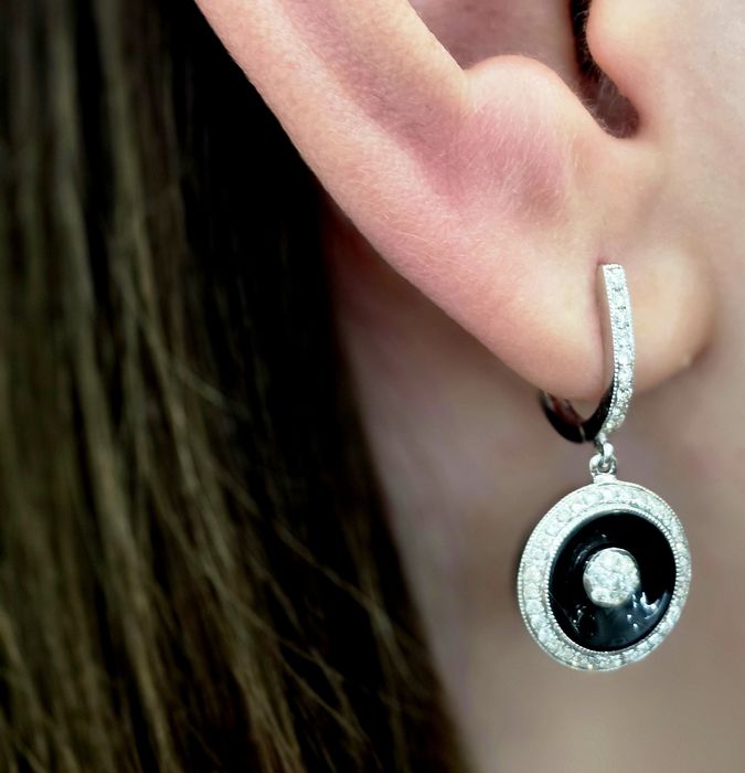 Золотые серьги производство Италия