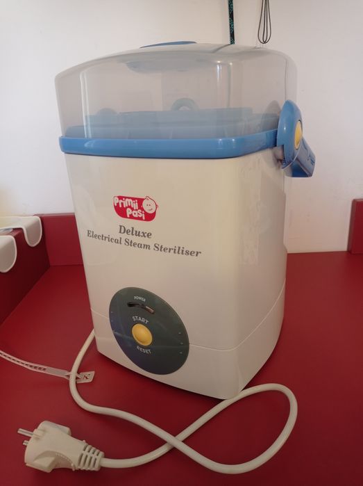 Sterilizator electric cu aburi pentru biberoane - Primii Pasi