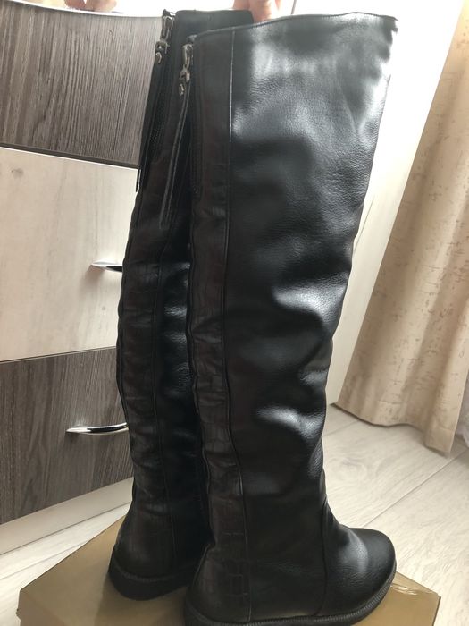 Продам сапоги новые