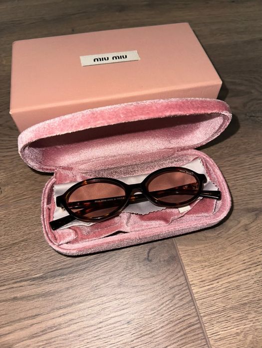 Нови Miu Miu Regard tortoiseshell-effect sunglasses