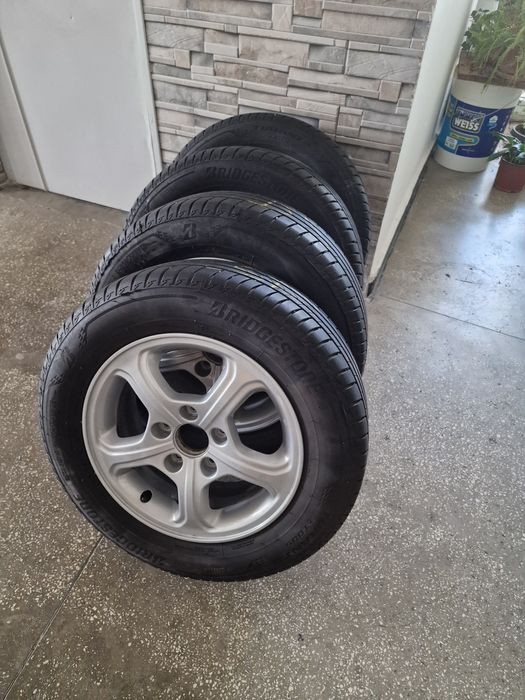Jante aliaj originale Honda 15" plus anvelope vară Bridgestone Turanza T005 195/65 R15 91H