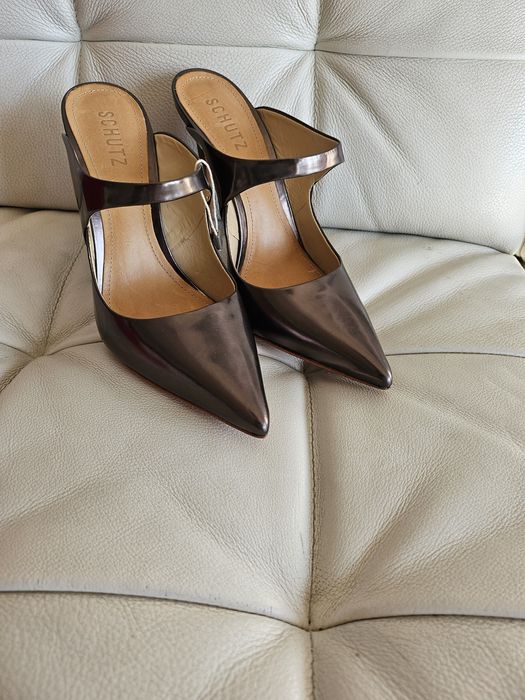 Saboti Schutz noi, nr 38 cu toc 12 cm inaltime, culoarea

aramiu-bronz