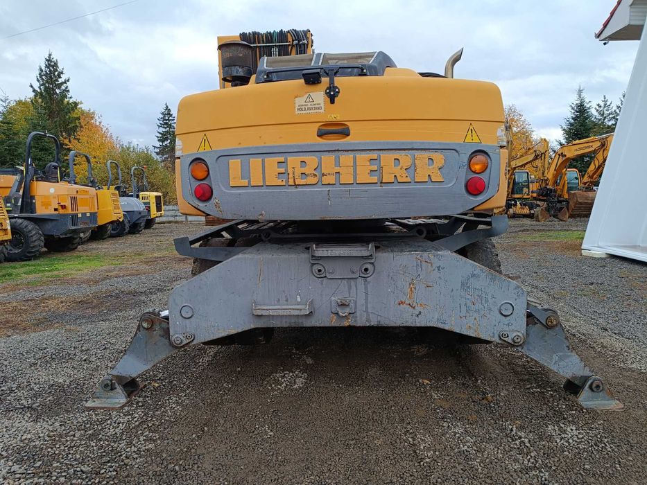 Excavator pe roti Liebherr A316, 21 tone, pentru manipulare, 2009
