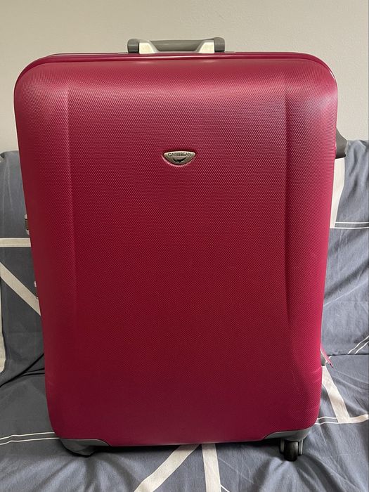 Чемодан CAROBBEAN розовый 105 -110 л