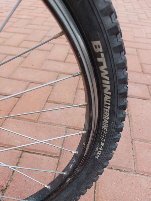 Bicicleta ROCKRIDER ST 500
6 viteze roata de 20inch frâne pe tambur.
B