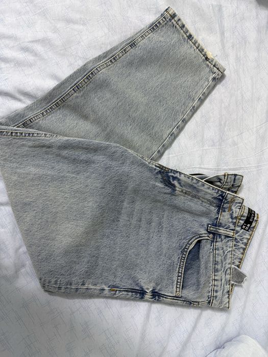 джинсы Tapered fit