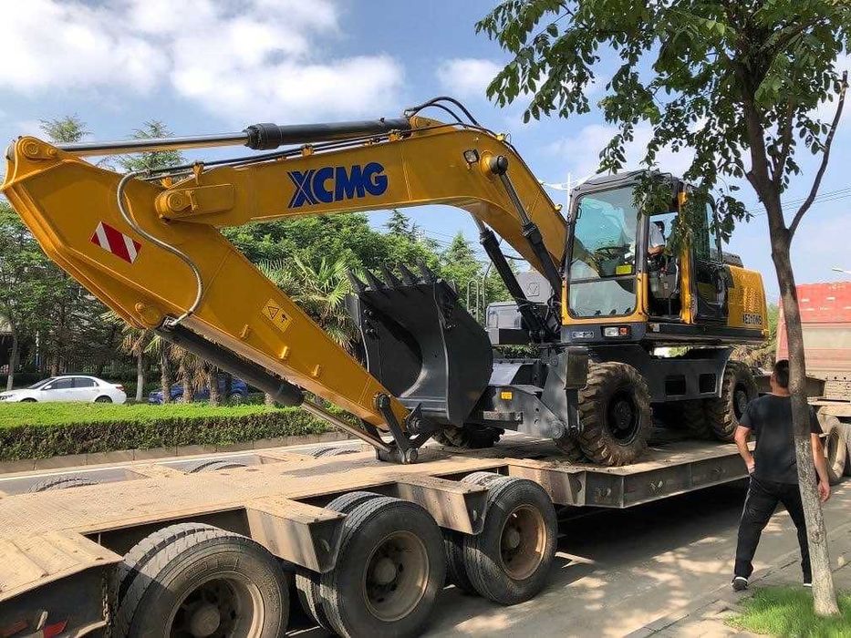 Колесный экскаватор xcmg xe210wb. Экскаватор xcmg xe210wb. Xe210w. Xcmg xe210w. Xcmg 210 экскаватор колесный.