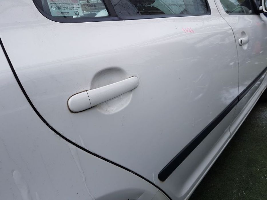 Usa / Portiera Dreapta Spate Skoda Octavia 2 2003 - 2013 Cod Culoare 1026