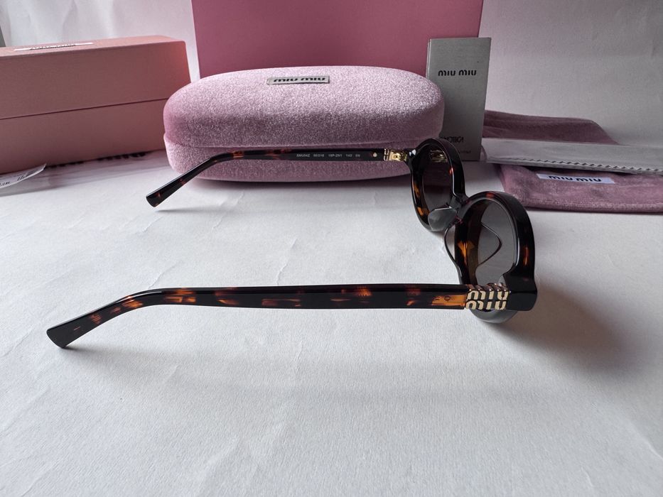 Ochelari de soare Miu Miu Oval SMU04Z 50-18 140, Noi