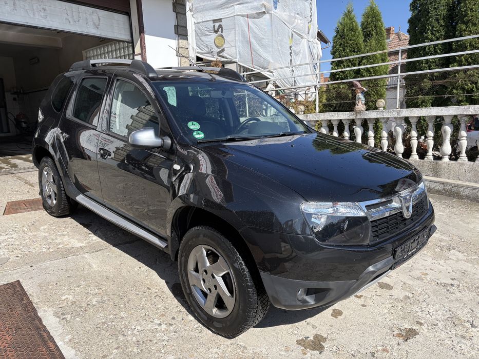Dacia duster 1,6 benzina +Gpl de fabrica /An 2013/4x2/Aer conditionat /Tapiterie piele