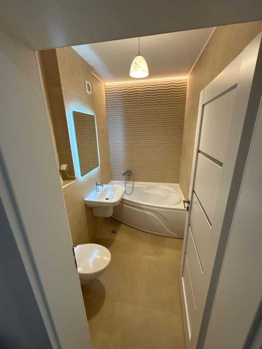 Închiriez Garsoniera noua tip Studio centrală, cu parcare