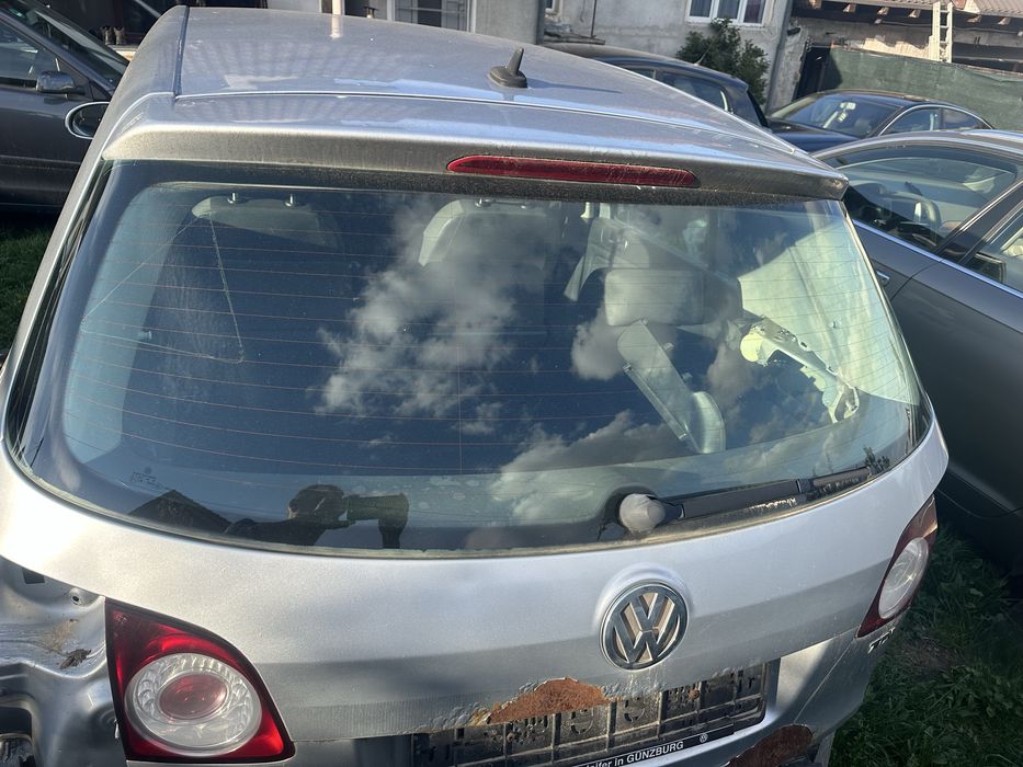 Luneta spate , icuietoare haion, stopuri haion ,motoras stergator ,vw golf 5  Plus