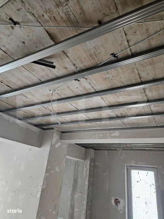 Apartament 3 camere, 2 bai, decomandat, etaj intermediar, zona Tractor