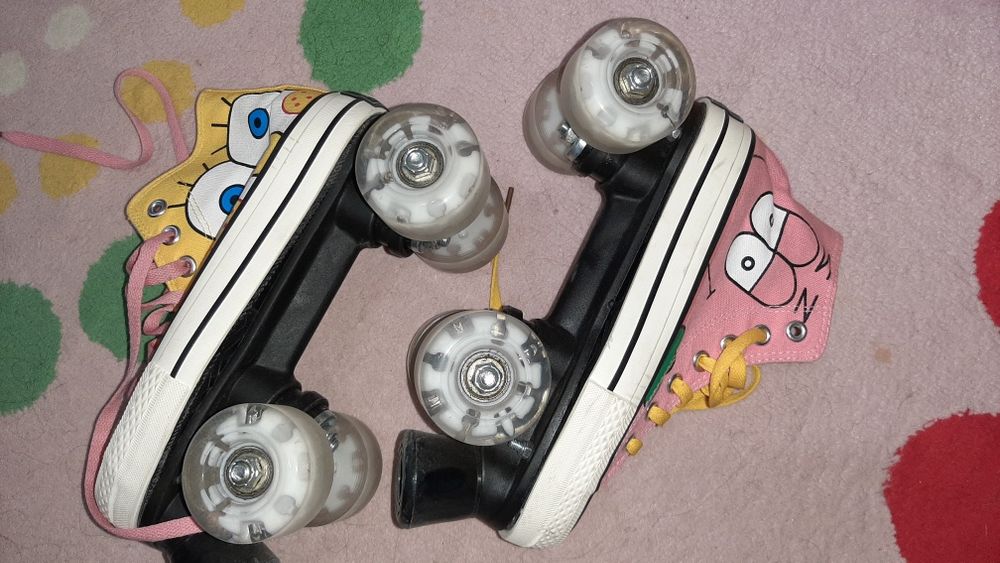 Роликовые коньки