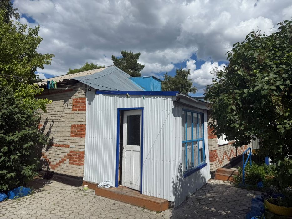 Продам двухквартирный дом в селе Карасу